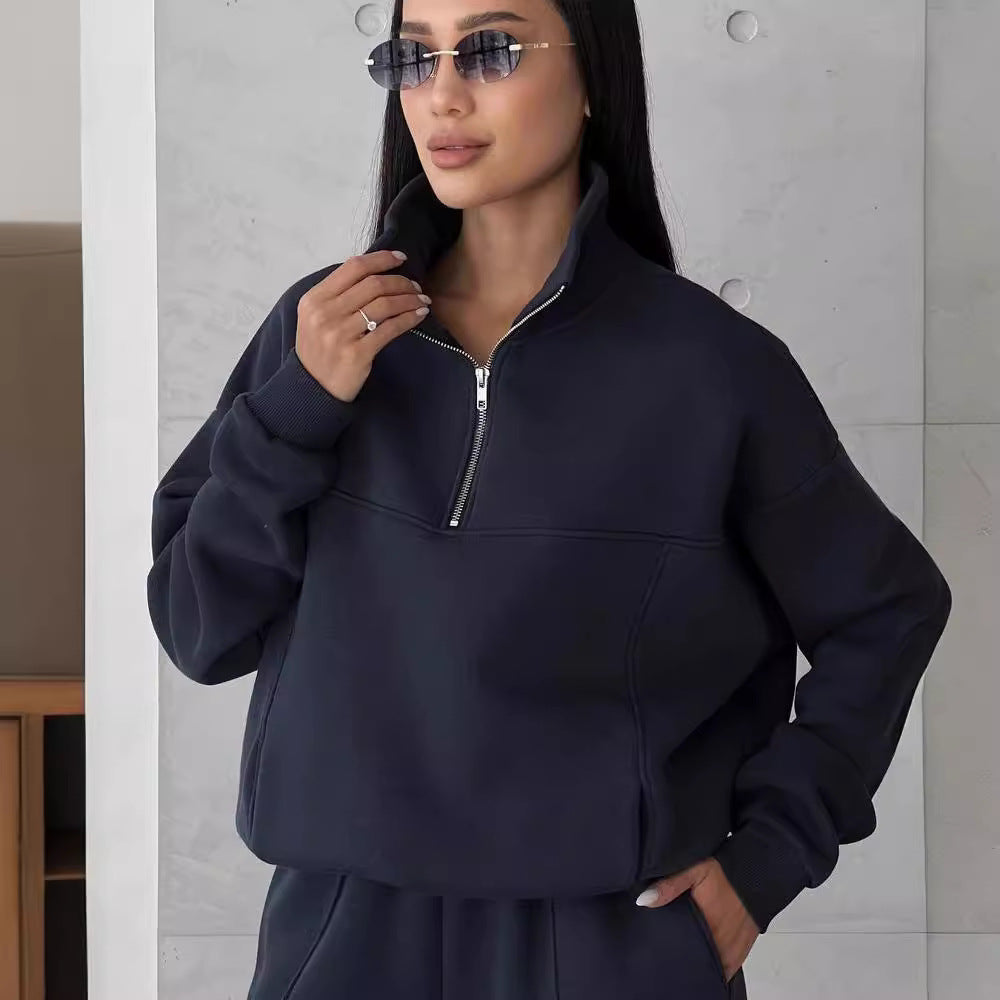 Agate apricot-colored autumn tracksuit set with contrast sport jacket and matching pants, casual athletic wear for women.