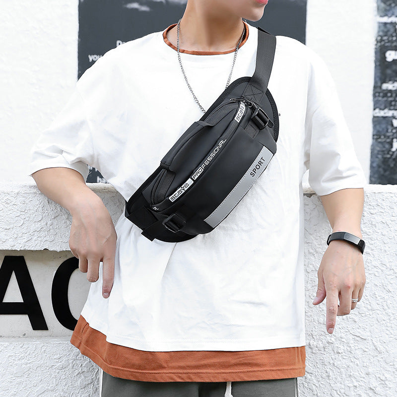 Black reflective waist bag for men by Agate, designed as a crossbody bag with adjustable strap and sleek reflective material.
