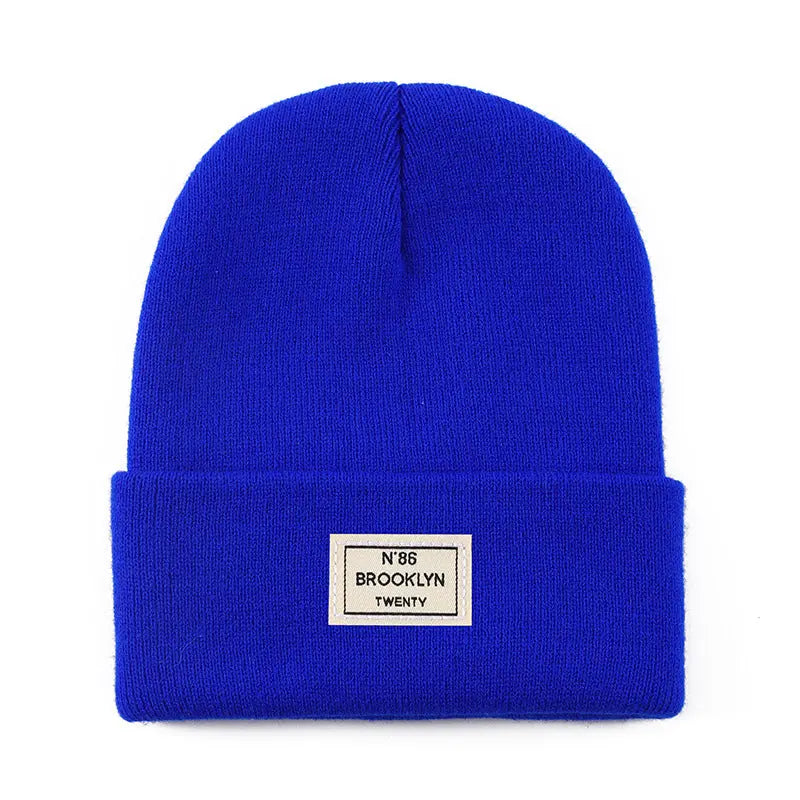 Knitted Beanie With Brand Label Stylish And Fashionable - Alvionz.de