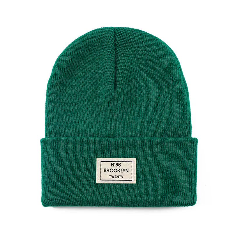 Knitted Beanie With Brand Label Stylish And Fashionable - Alvionz.de