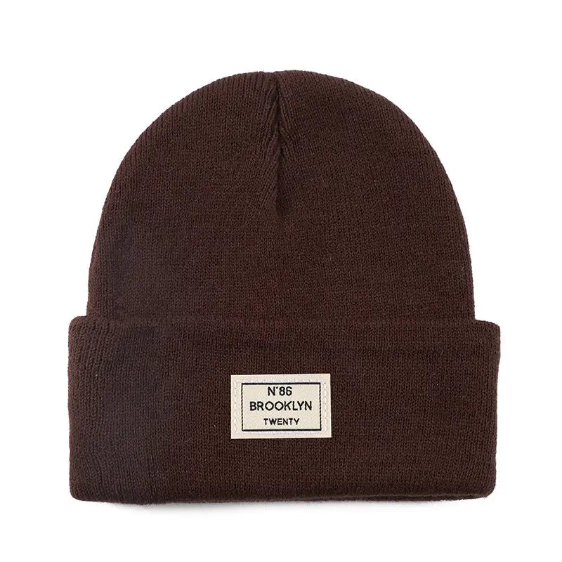 Knitted Beanie With Brand Label Stylish And Fashionable - Alvionz.de