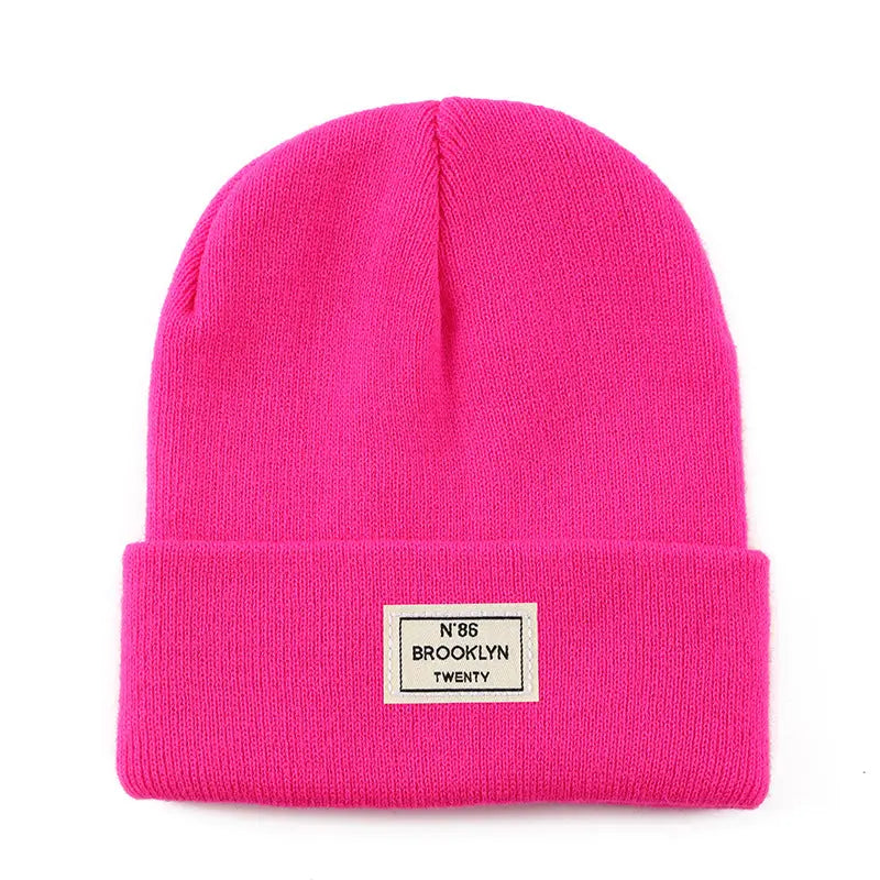 Knitted Beanie With Brand Label Stylish And Fashionable - Alvionz.de