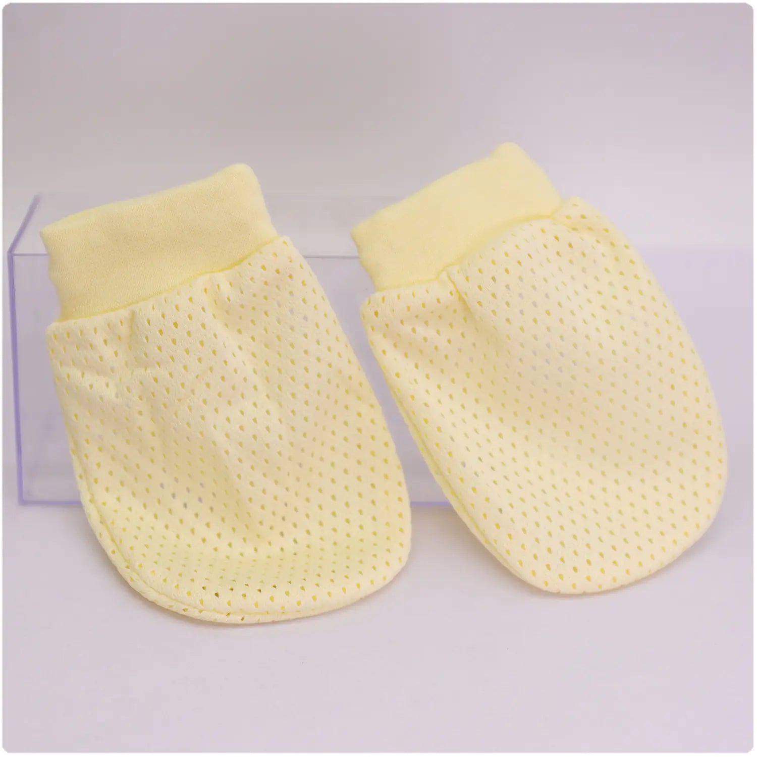 Adjustable anti-scratch infant and newborn mittens in a color mix, designed to protect delicate skin from scratches.
