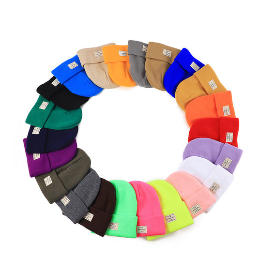 Knitted Beanie With Brand Label Stylish And Fashionable