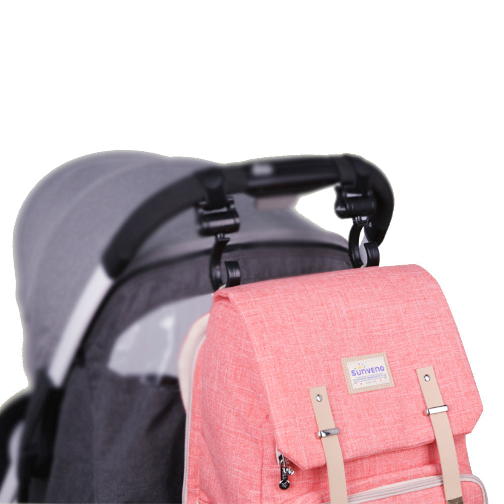 Gray canvas diaper bag travel backpack by Maroon Chronos with multiple compartments and adjustable straps.