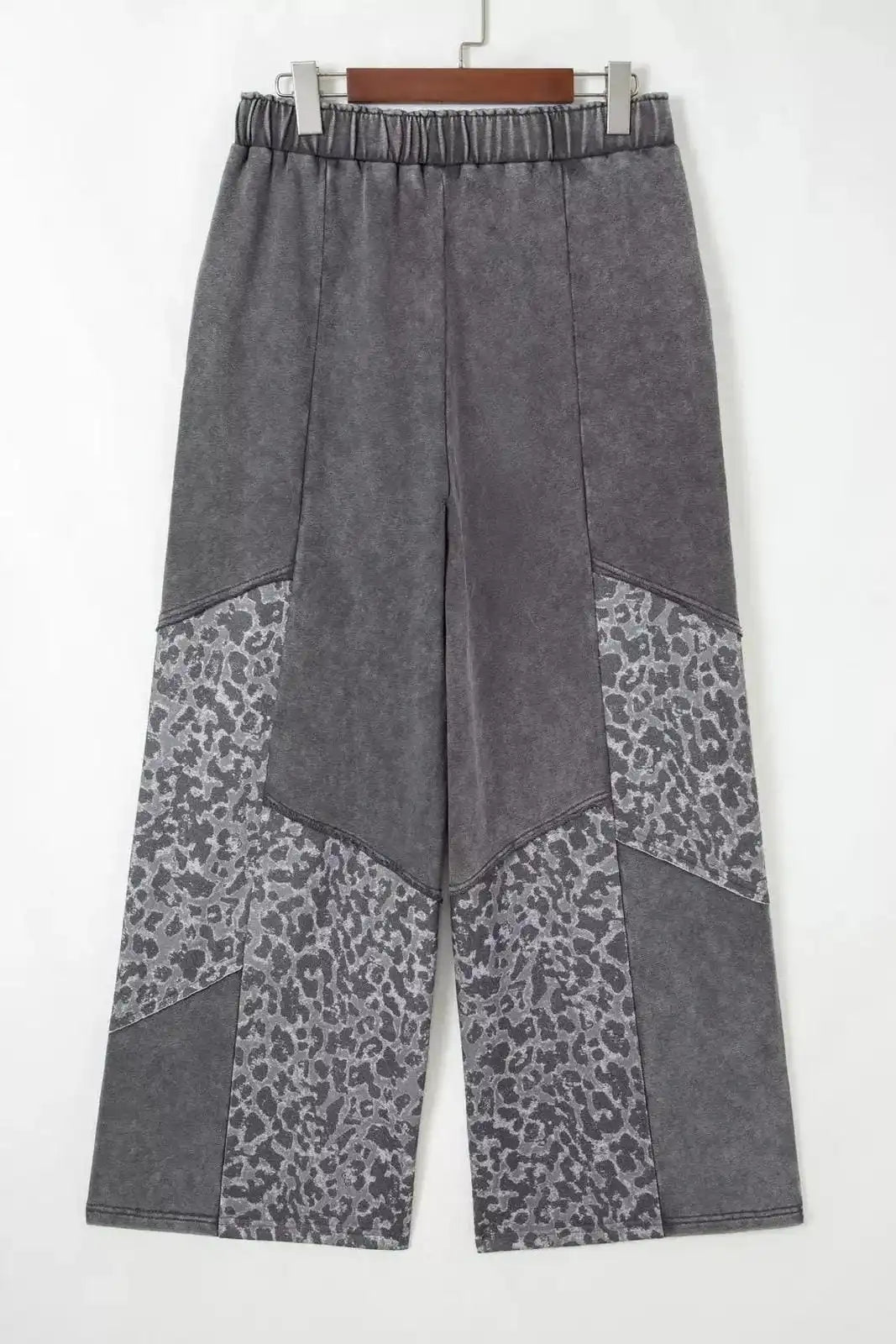 Dark gray mineral wash leopard patchwork loose pants by Trendsi with relaxed fit and stylish design.