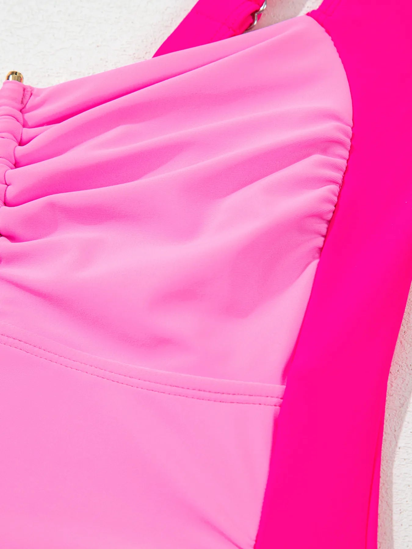 Fuchsia pink ruched tummy control tankini 2-piece swimsuit by Trendsi, featuring a fitted tankini top and matching bottoms.