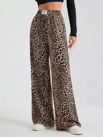 Full size leopard print wide-leg pants by Trendsi, plus size, featuring a bold animal pattern and flowing wide-leg fit.