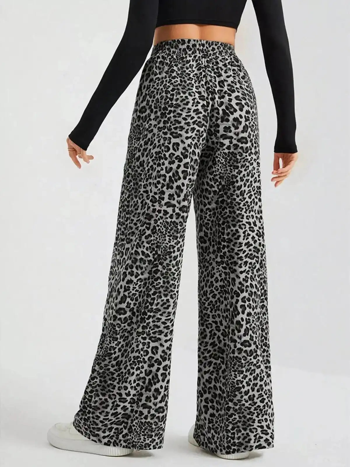 Full size leopard print wide-leg pants from Trendsi, plus size, featuring a bold animal pattern and relaxed fit.