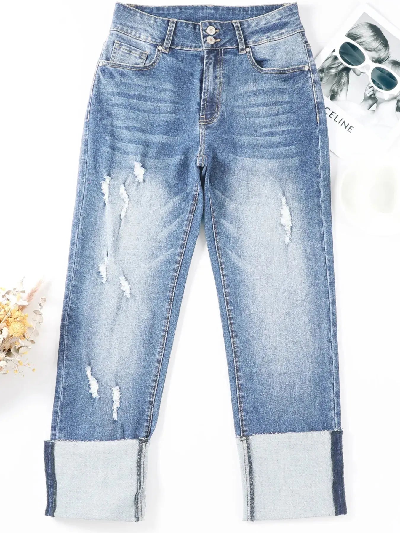 Light blue high waist distressed straight leg jeans by Trendsi, showing fit and ripped details on denim fabric.