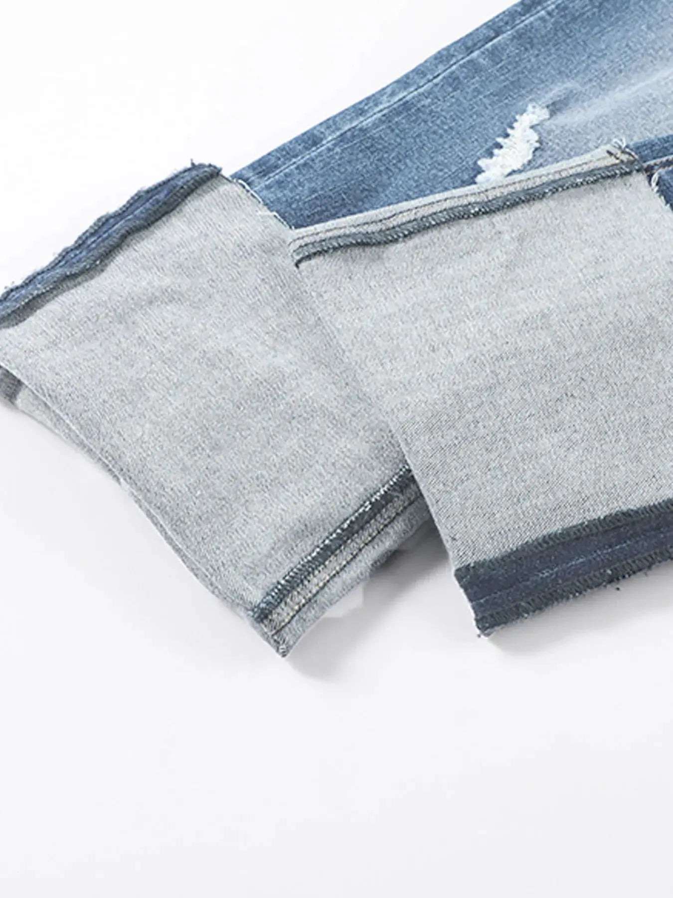 Light blue high waist distressed straight leg jeans by Trendsi, featuring ripped details and classic denim fit.