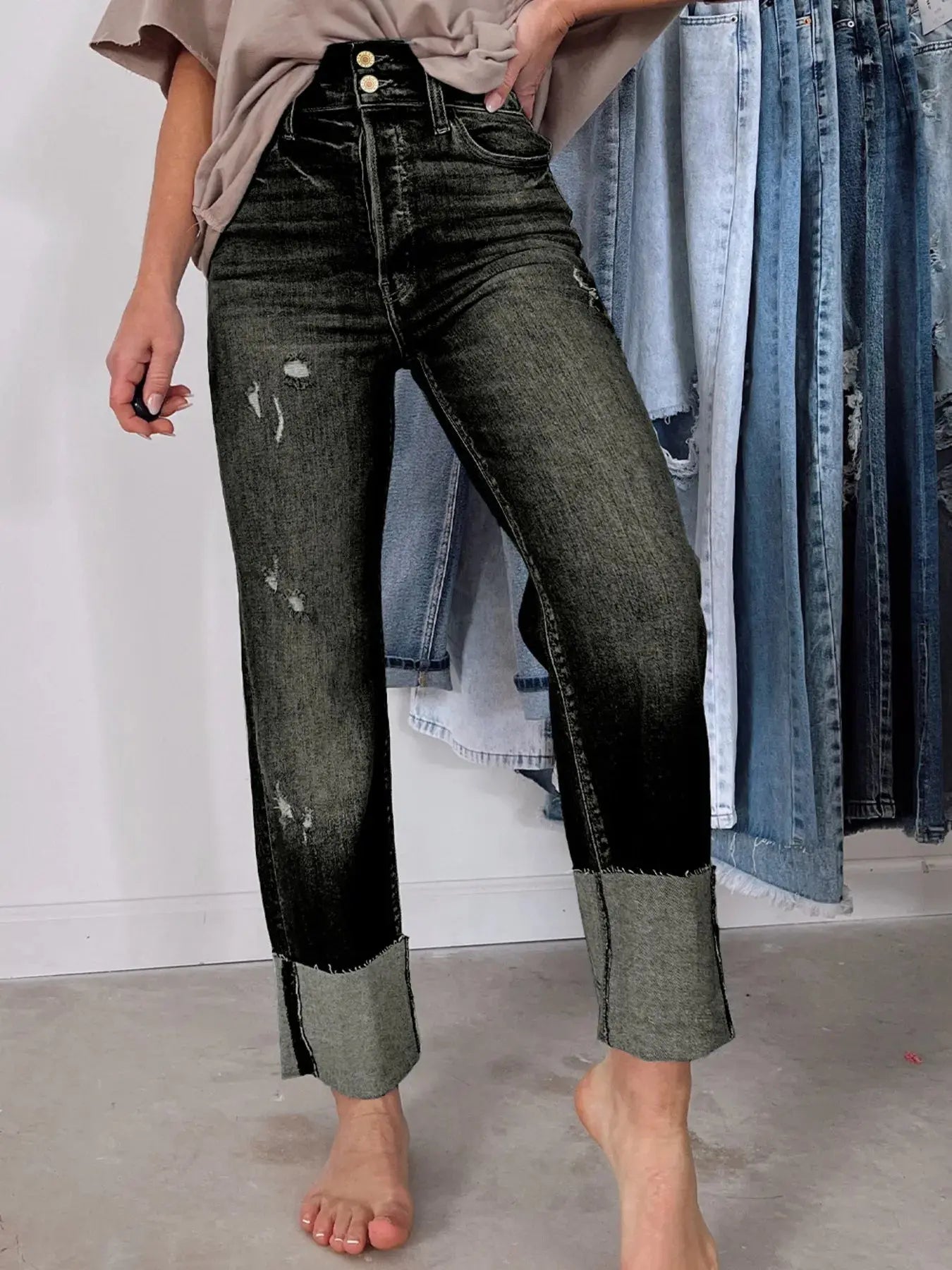 Light blue high waist distressed straight leg jeans by Trendsi, showing fitted waist and casual distressed denim style.