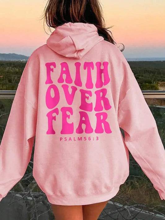 Pink FAITH OVER FEAR dropped shoulder hoodie by Trendsi, featuring a relaxed fit and casual style.