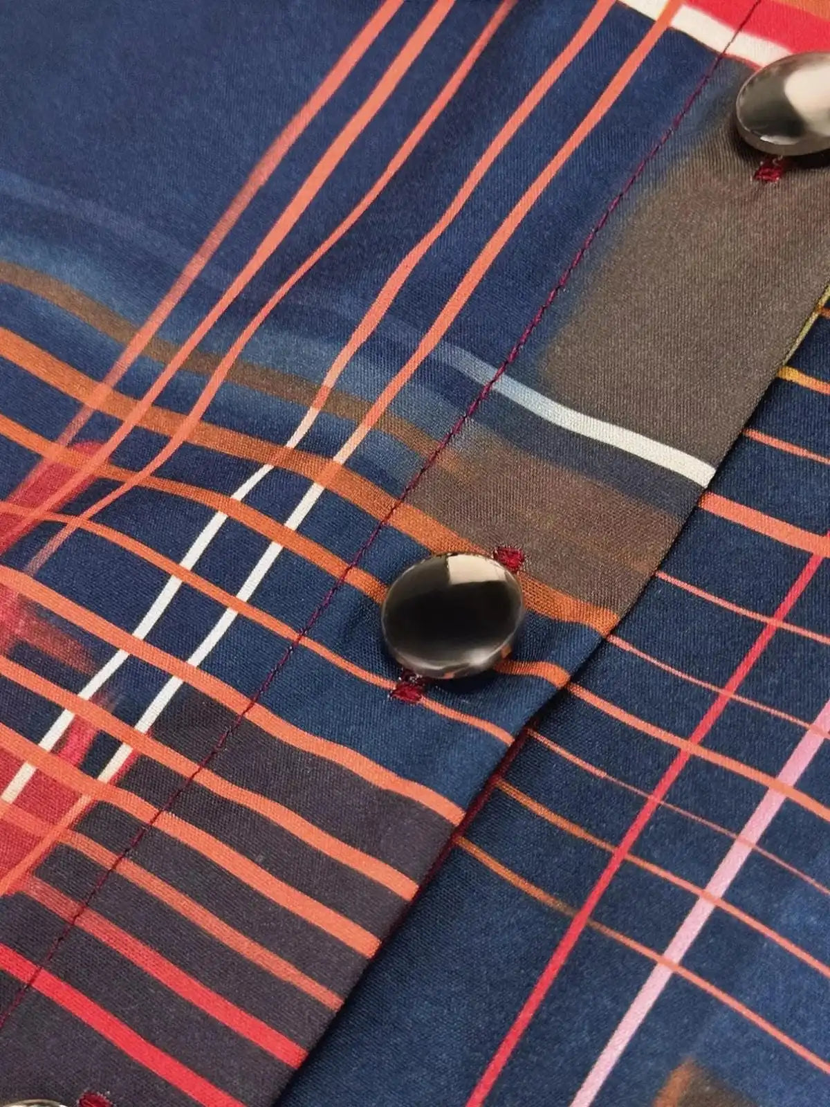 Trendsi plaid long sleeve shirt dress with a button-up front and collar, featuring a classic checkered pattern and a relaxed fit.