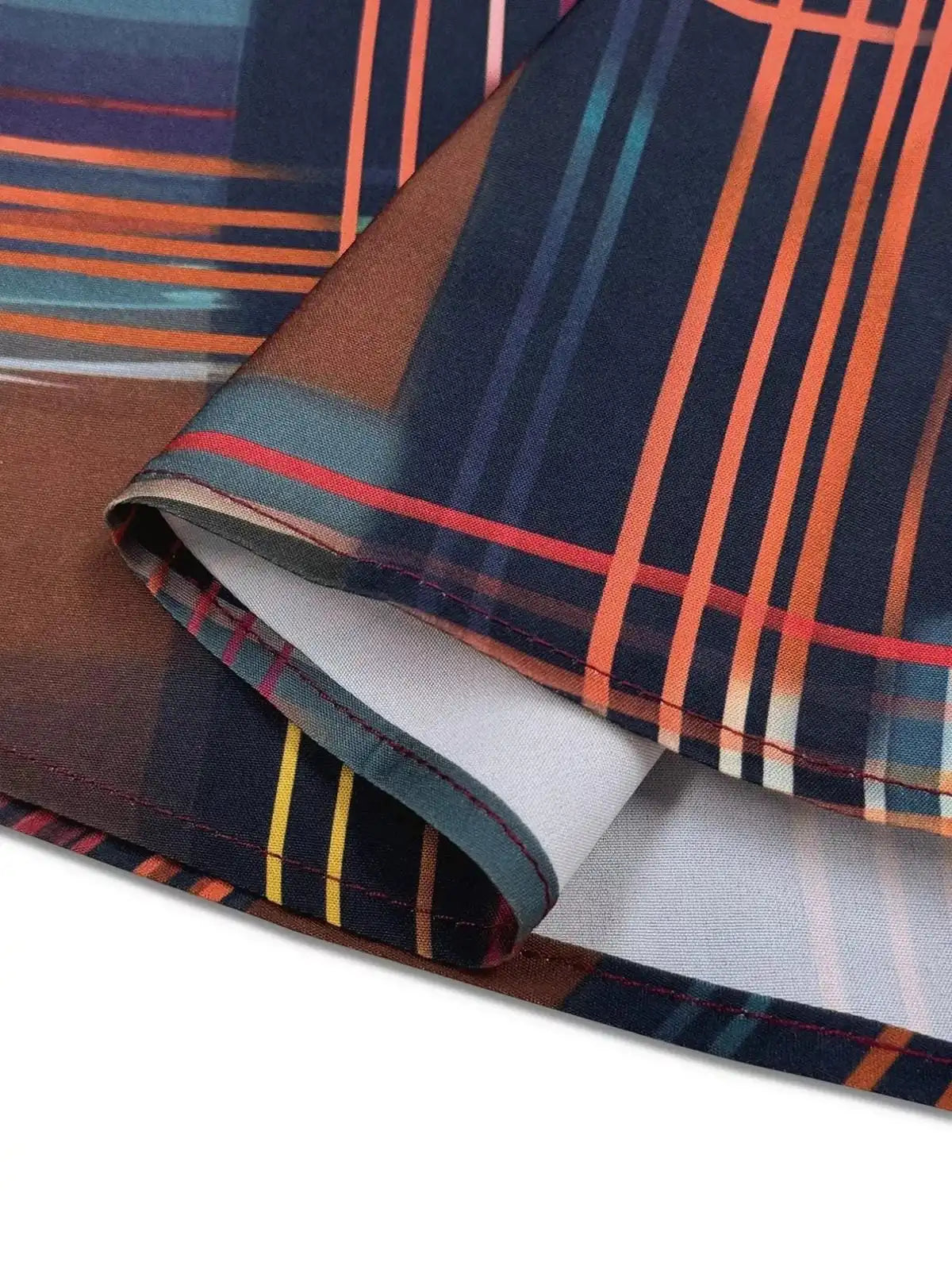 Plaid long sleeve shirt dress by Trendsi featuring a button-up front, collar, and relaxed fit in a classic plaid pattern.